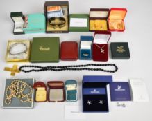 A collection of jewellery including Swarovski earrings, other earrings, faux pearls, silver