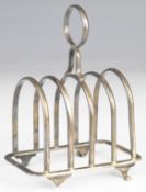 George V hallmarked silver five bar toast rack, London 1928, maker Robert Pringle & Sons, length 8.