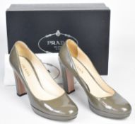 Prada pair of grey / green patent leather high heeled platform shoes, size 39, in box