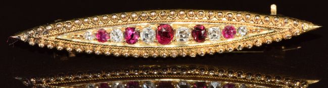 An 18ct gold brooch set with rubies and old cut diamonds, 4.2g, 4.5cm
