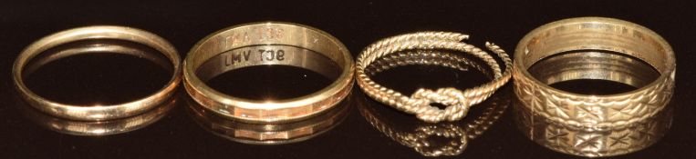 Three 9ct gold wedding bands / rings (5.1g, size N & Q) and a 9ct gold knot ring (0.9g, size K)
