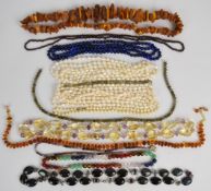 A collection of beaded necklaces including freshwater pearls, cultured pearls with 9ct gold clasp,