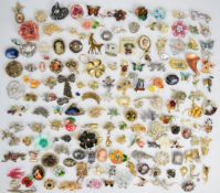 A collection of vintage brooches including Capri, marcasite and enamel, etc