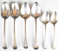 Georgian hallmarked silver table and dessert spoons including a pair of feather edged examples,