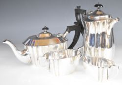 George V hallmarked silver four piece teaset comprising teapot, sugar bowl, milk jug and hot water