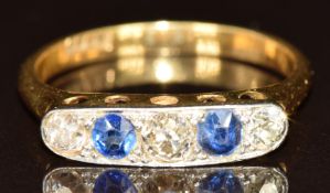 Art Deco 18ct gold ring set with three old cut diamonds, the centre diamond approximately 0.2ct, and