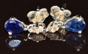A pair of 14k white gold earrings each set with a pear cut sapphire and diamonds, 1.1g