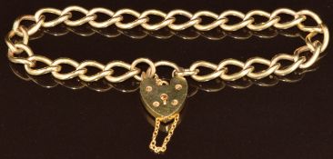 A 9ct gold curb link bracelet with heart padlock clasp, 15.7g, 18cm