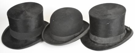 Two silk top hats and a bowler hat, top hats 6¾ or 21 5/8, the bowler slightly smaller