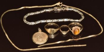 A 9ct gold signet ring (1.6g, size O), 9ct gold ring set with a tiger's eye cabochon (3.2g, size N),