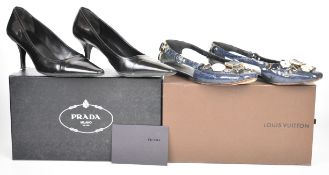 Louis Vuitton pair of navy patent pumps with button decoration, size 38, in box together with a pair