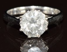 An 18ct white gold ring set with a round brilliant cut diamond of approximately 2.1ct, 4g, size M