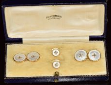 A pair of 9ct gold cufflinks set with mother of pearl, with two matching studs, in Selfridge