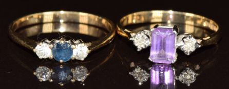 Two 9ct gold rings, one set with an amethyst and diamonds and the other a sapphire and cubic