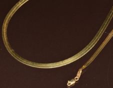 A 10k gold ribbon necklace and bracelet,11.2g, 50.5 & 20cm