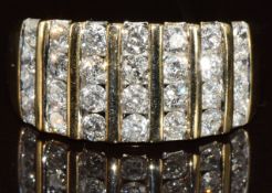 A 9k gold ring set with seven rows of round cut diamonds totalling 1ct, 3.8g, size L