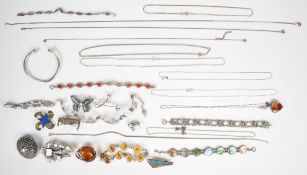 A collection of silver jewellery including eight bracelets set with moonstone, onyx, ivy link,