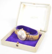 Smiths 9ct gold gentleman's wristwatch with gold hour markers, silver dial and signed 17 jewel