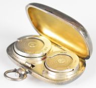 Edward VII hallmarked silver sovereign case with spring loaded slots for full and half gold