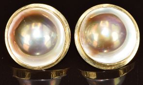 A pair of 14k gold earrings each set with a blister pearl, 2.4cm, 21.8g