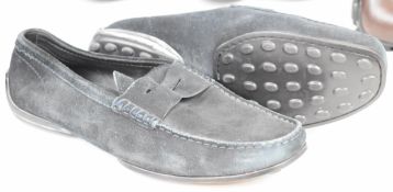 Two pairs of Louis Vuitton gentleman's leather loafers, both size 8, a pair of Tod's suede driving