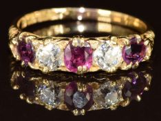 Victorian 18ct gold ring set with two old cut diamonds, each approximately 0.3ct, and three oval cut