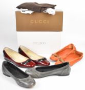 Three pairs of designer ladies shoes comprising Jimmy Choo 'Watson' patent wine coloured pumps, size