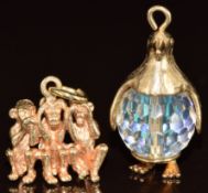 A 9ct gold charm in the form of a penguin set with a crystal bead (5.5g, 2.5cm) and 9ct gold charm