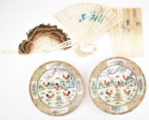 Pair of Chinese famille verte plates with rooster decoration marked 'Made in China' verso (24cm in