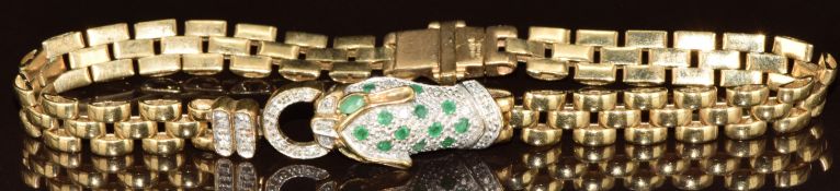A 9ct gold bracelet in the form of a leopard set with emeralds and diamonds, 10.8g, 18cm