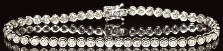 An 18ct white gold bracelet set with 54 diamonds, each 0.01ct, 9.8g, 17.5cm