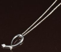 A 18ct white gold pendant set with two diamonds of approximately 0.07ct & 0.12ct by Stockert (2.4cm)