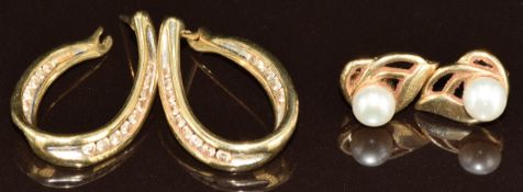 A pair of 9ct gold hoop earrings set with diamonds and a pair of 9ct gold earrings set with