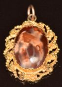 Victorian pendant set with an agate cabochon with cannetille border, 2.5 x 2cm, 5g