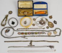 A collection of mainly silver jewellery including three bangles, watch chains, miniature mirrors,