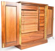 Modern hardwood coin collector's cabinet, the twin panelled doors opening to reveal eight