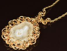 A yellow metal abstract pendant set with quartz, on 9ct gold chain, 67.1g, pendant 5.5 x 8.5cm,