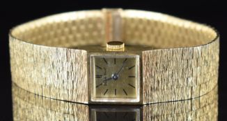 Bueche Girod 9ct gold ladies wristwatch with black hands and baton hour markers, gold dial and 17