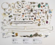 A collection of silver jewellery including Pandora bracelet, two further bracelets, silver charms,