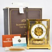 Jaeger-Le-Coultre Atmos mantel clock with gilt brass case, white painted dial and applied numerals