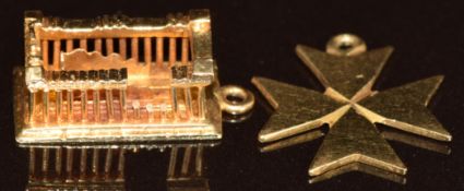 An 18ct gold pendant in the form of a Maltese cross (0.9g) and a 14k gold charm in the form of the