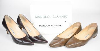Two pairs of Manolo Blahnik shoes comprising burgundy leather stilettos and a pair of brown