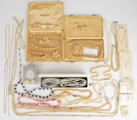 A collection of jewellery including Christian Dior earrings in original box, two suites of Trifari