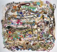 A collection of pendants and necklaces including Trifari, pearls, agate, Monet, vintage beads,