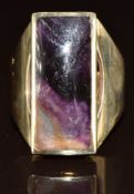 A 9ct gold ring set with a rectangular Blue John cabochon (23 x 10mm), 10.8g, size R