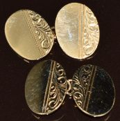 A pair of 9ct gold cufflinks with scrolling decoration, 7.9g