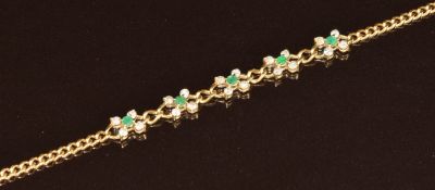 An 18ct gold bracelet set with emeralds and diamonds, 4.1g, 17cm