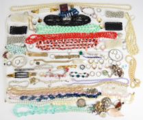 A collection of jewellery including eight silver rings, silver gate bracelet, rolled gold