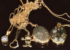 Two 9ct gold lockets, 9ct gold 'Garfield' charm, four 9ct gold chains and heart pendant, 9.5g