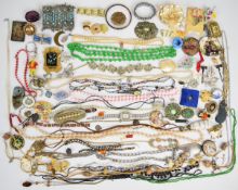 A collection of jewellery including vintage brooches, Art Deco Empire bracelet, Georgian cross